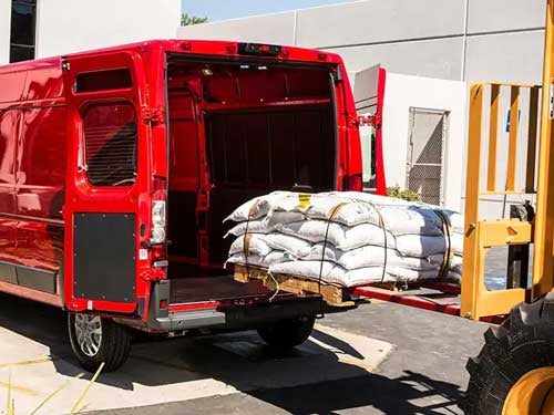 2023 RAM ProMaster view of cargo getting loaded into back of van