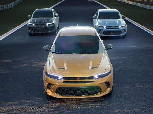 2023 Dodge Hornet times 3 driving down the road